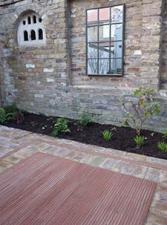 Garden paving with creasing tiles on edge 1